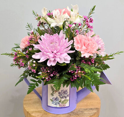 Petals and Wings Watering Can Arrangement from Bakanas Florist & Gifts, flower shop in Marlton, NJ