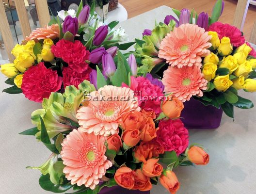 Vibrant Spring Cube Arrangement from Bakanas Florist & Gifts, flower shop in Marlton, NJ