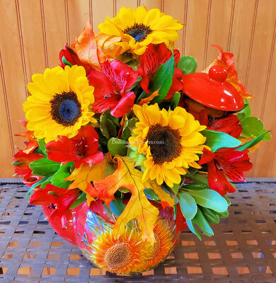 Rustic Sunflowers Tea Pot Arrangement from Bakanas Florist & Gifts, flower shop in Marlton, NJ