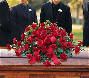 Red Regards Casket Spray from Bakanas Florist & Gifts, flower shop in Marlton, NJ